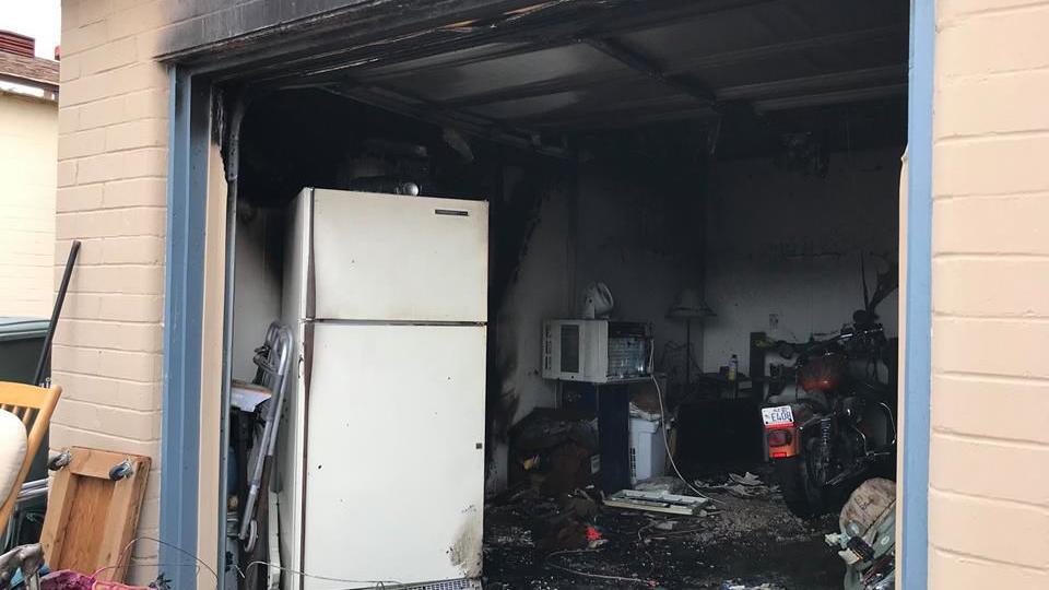 Dog alerts Tucson resident of fire in home's garage